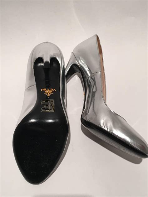 prada silver court shoes|Prada flat heel shoes.